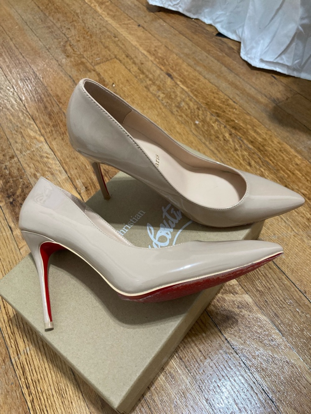 Christian Louboutin Beige Patent Pointed-Toe Pumps with Red Sole